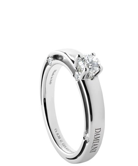 D.Side white gold and diamond solitaire ring