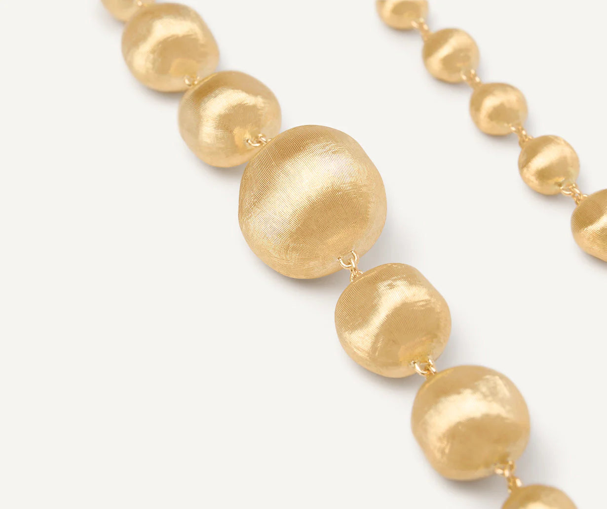 Collana con doppio degradé di sfere in oro giallo, Africa, Marco Bicego