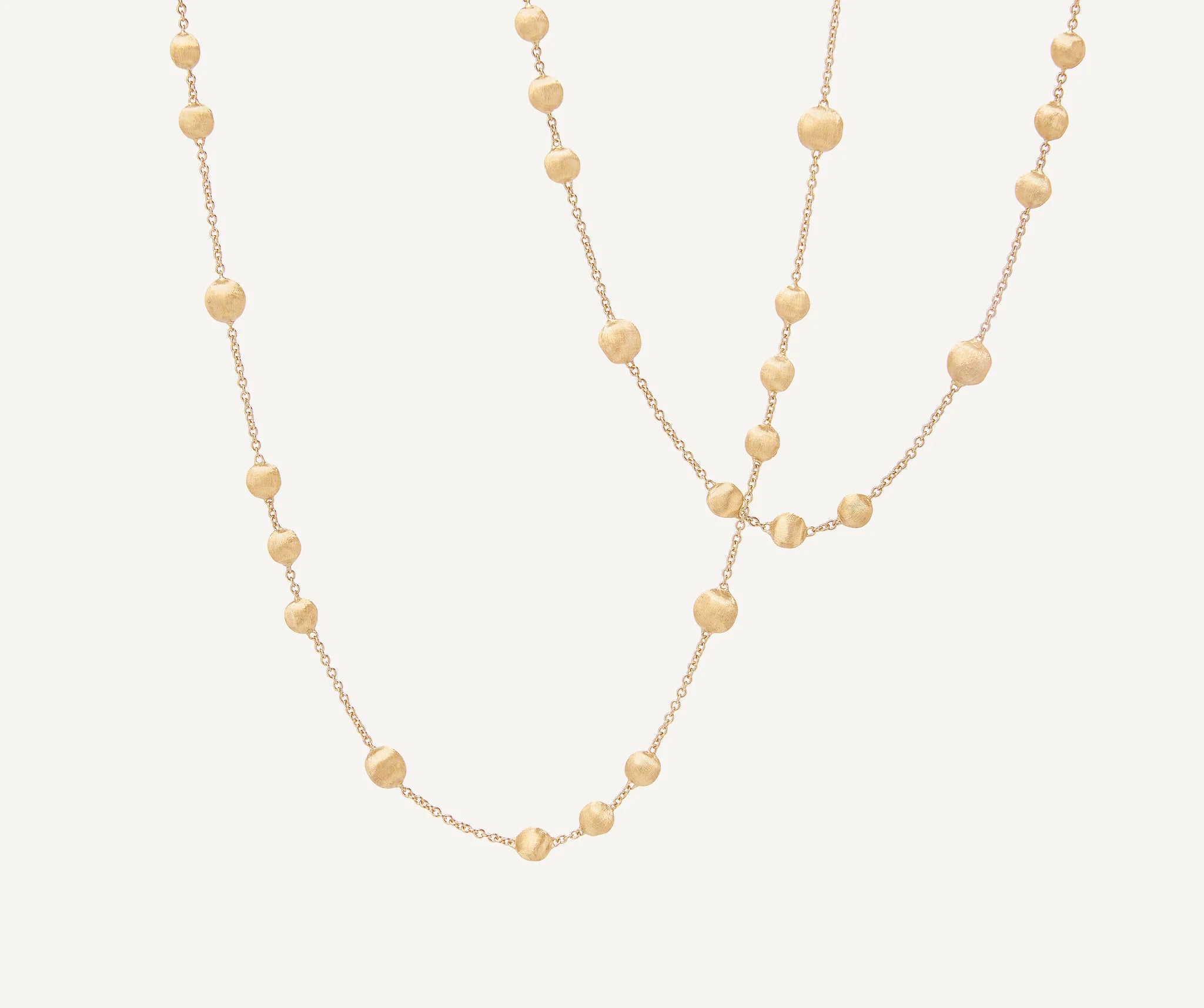 Collana lunga a catena con sfere in oro giallo,Africa, Marco Bicego
