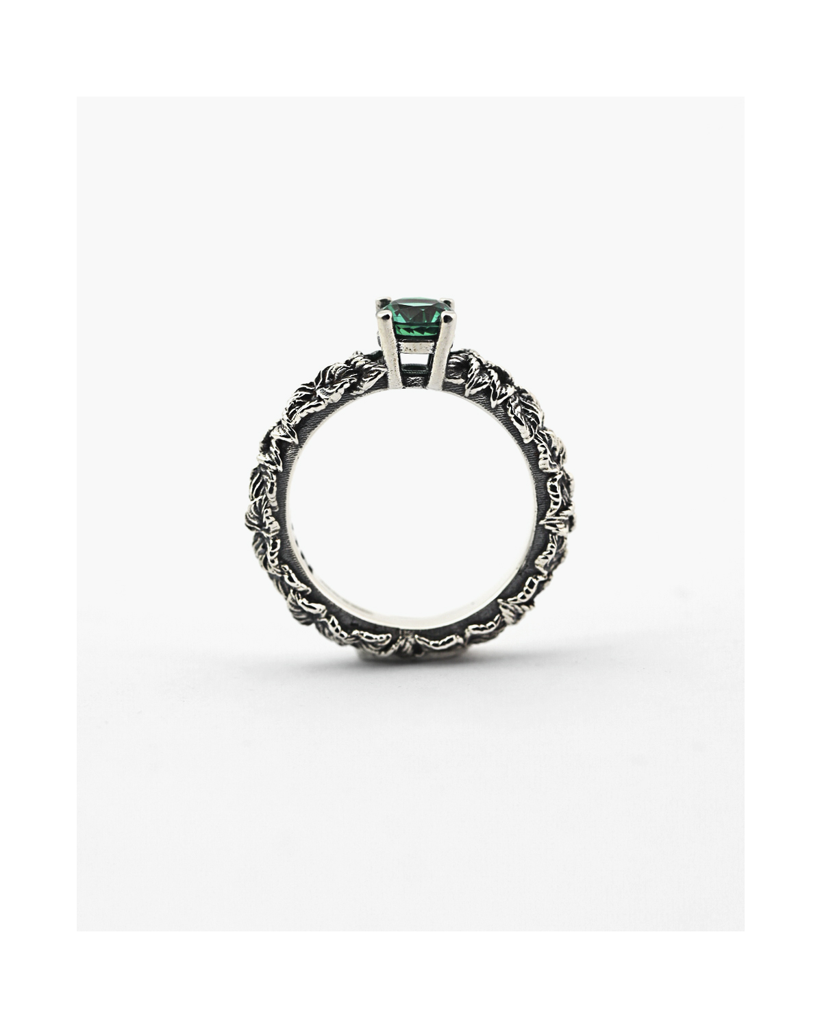 Silver solitaire leaf band ring with green cubic zirconia, Nove25