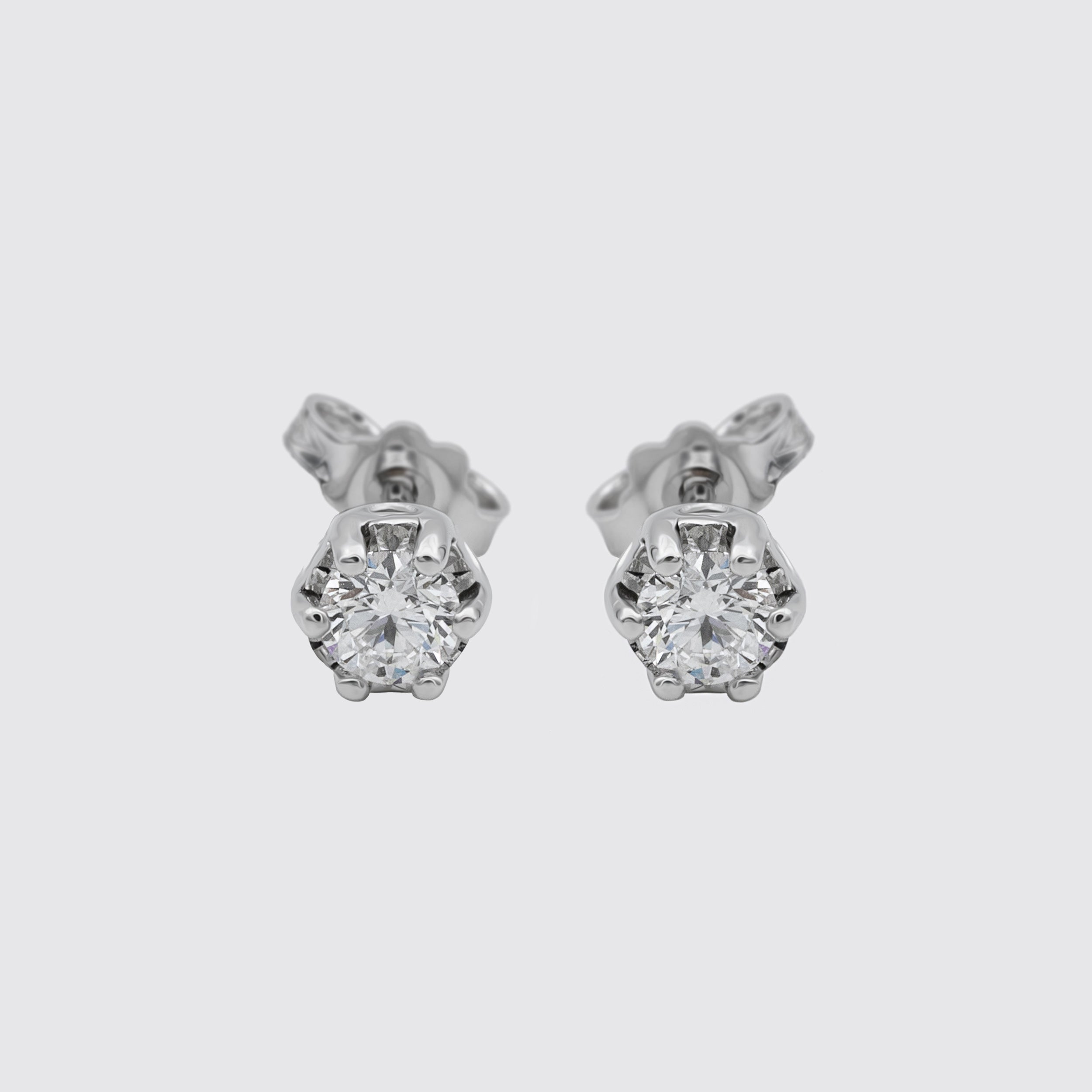 Orecchini punto luce Grace in oro bianco e diamanti ct. 0,30 Ferro Atelier