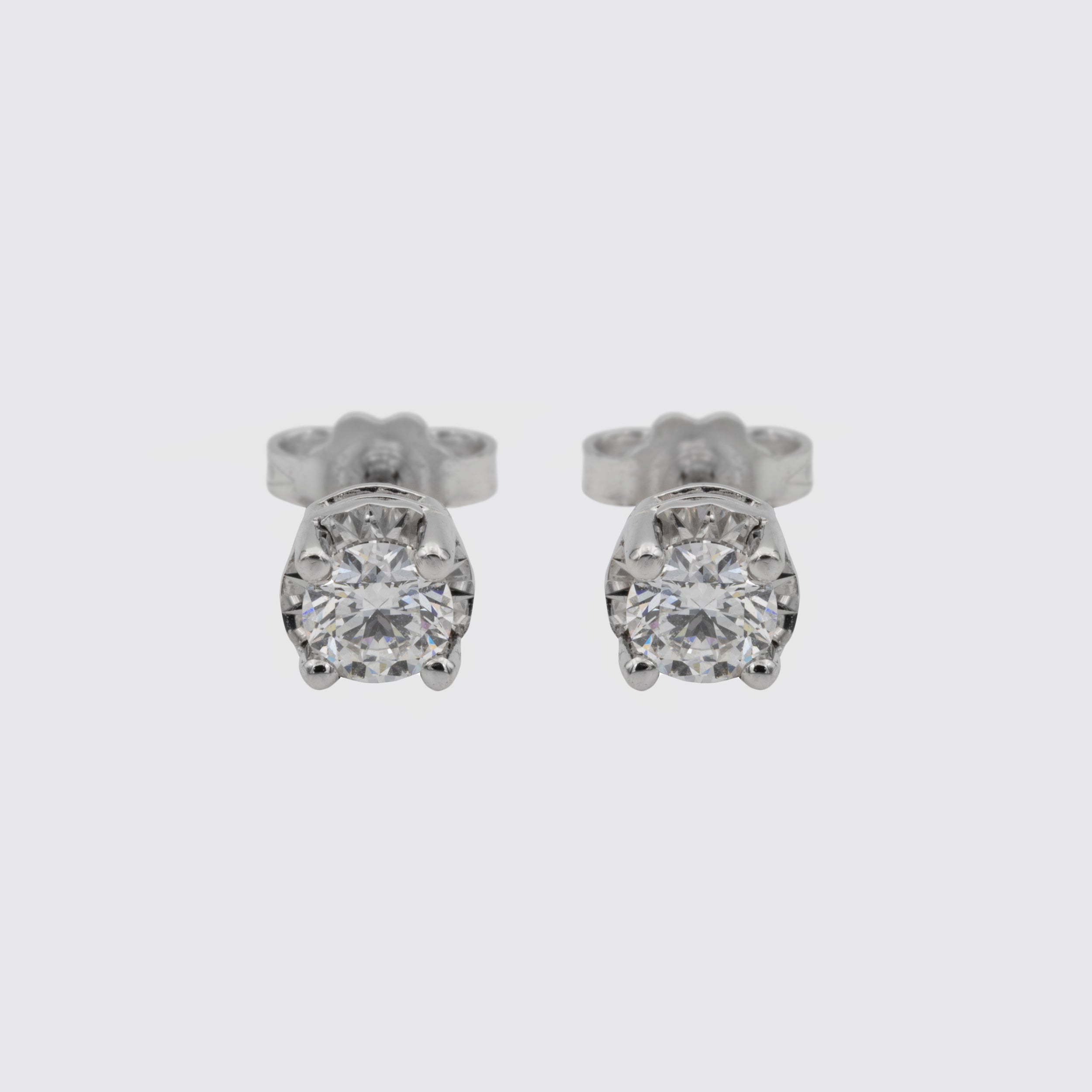 Solitaire ring in white gold and diamonds, Miluna