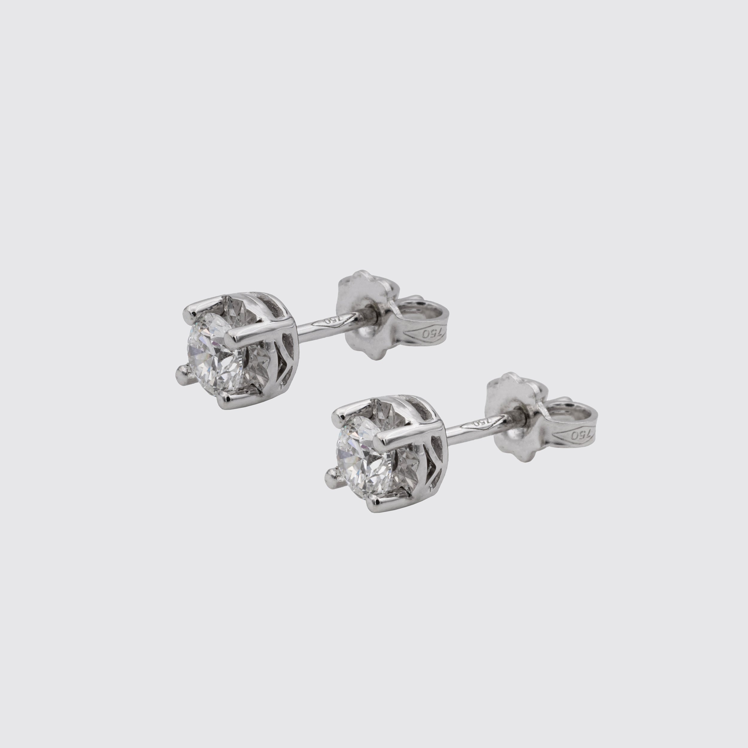 Solitaire ring in white gold and diamonds, Miluna