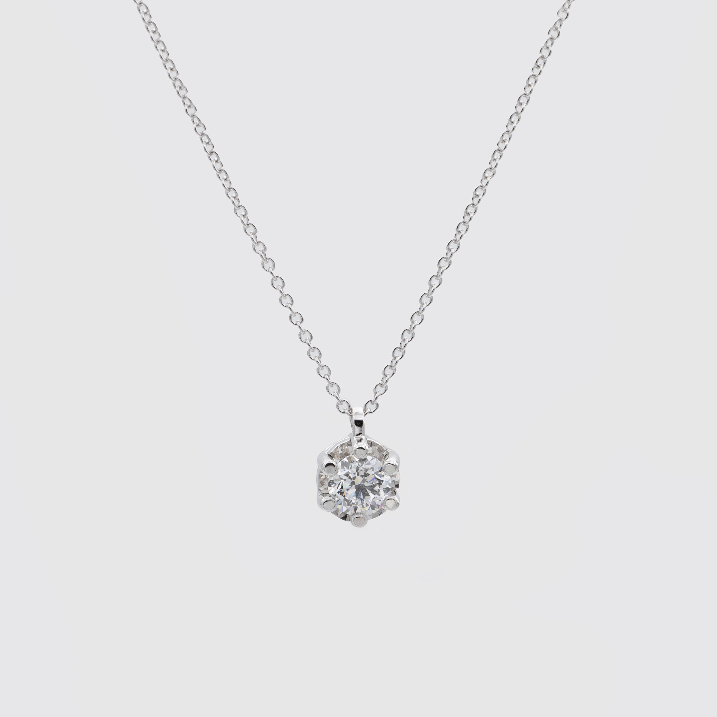 Solitaire ring in white gold and diamonds, Miluna