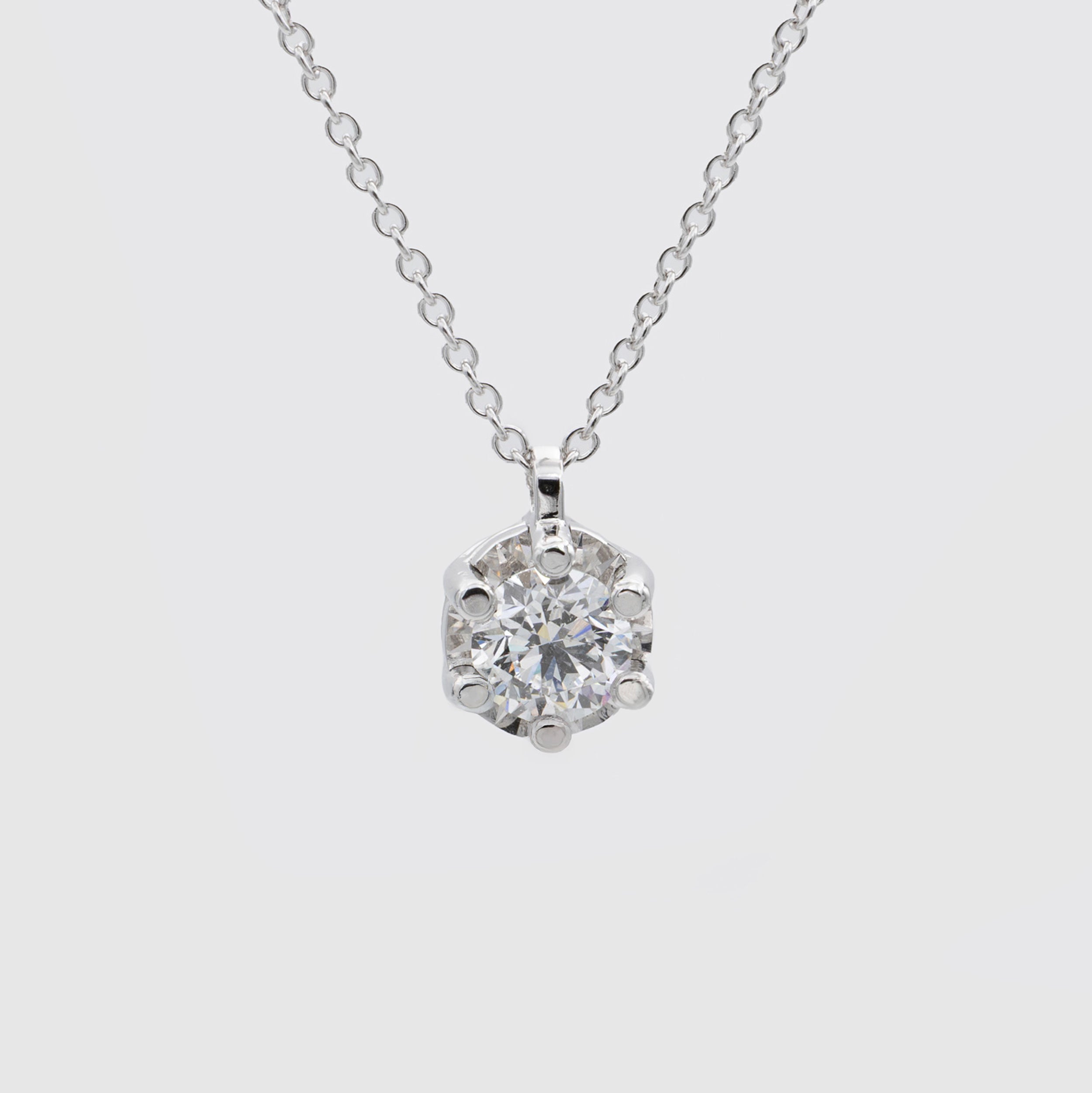 Solitaire ring in white gold and diamonds, Miluna